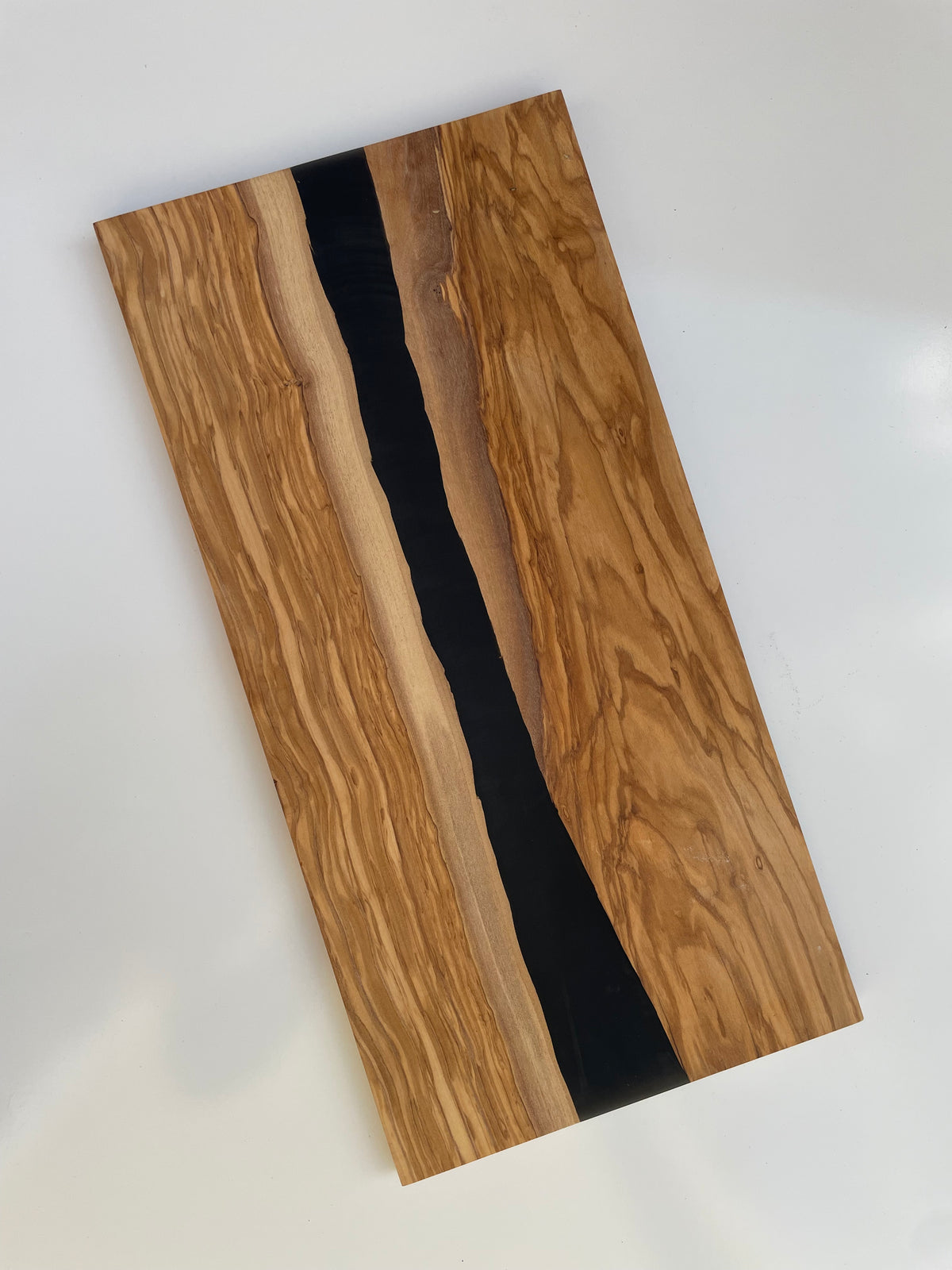 olive wood and black resin board